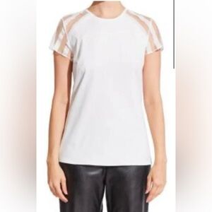 Snider White Stretchy Mesh Short Sleeves‎ Top Size M 
Classic elegant